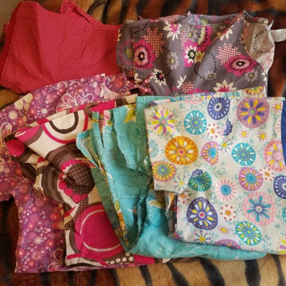 Women's small scrub tops $9 each/ red no longer av